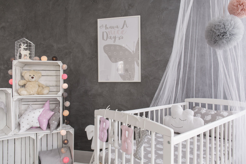 Shot of a cozy baby room with a canopy bed