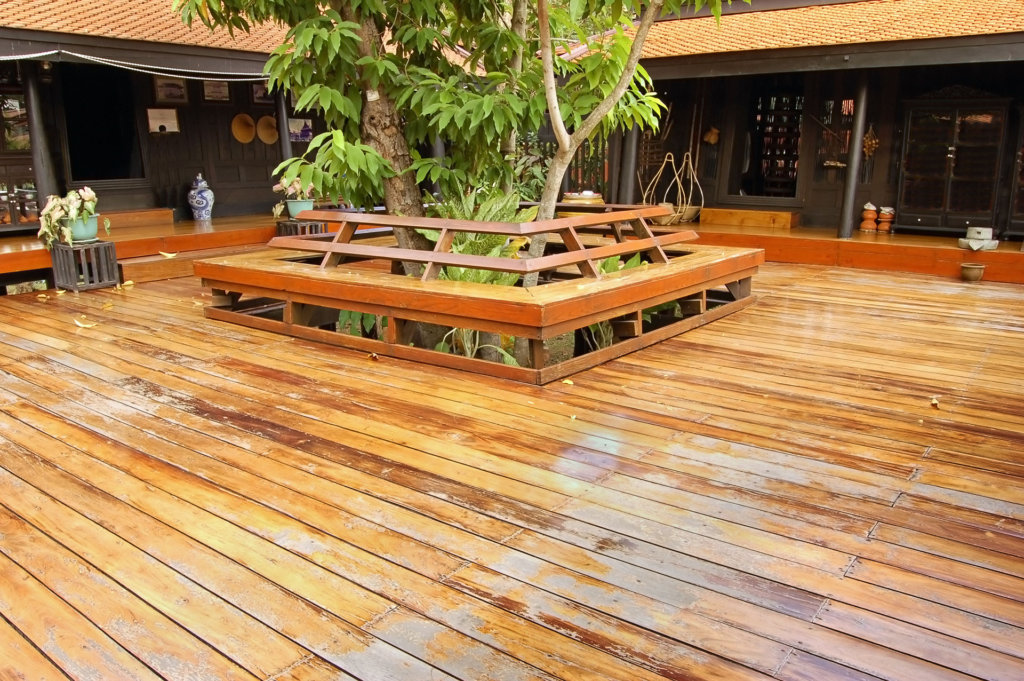 Central wooden veranda in a traditional Thai house