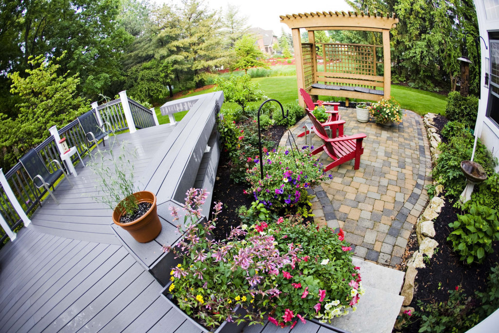 Outdoor living area with a deck and patio taken with a fisheye lens