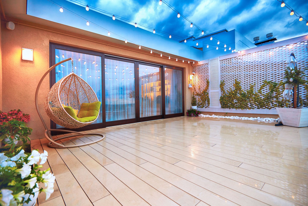 Evening patio area with sliding doors